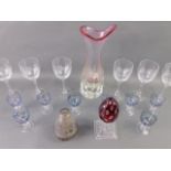 A set of six Edinburgh crystal wine glasses, frosted ruby glass egg on pedestal paperweight, eight