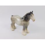 A Beswick pottery dapple grey Shire mare, printed mark, No 803, 24cm long.