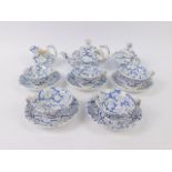 An early 19thC Staffordshire blue and white pottery part child's tea service decorated in a