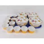A set of four Royal Worcester vegetable tureens and covers, decorated in the Evesham pattern,