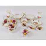 A group of Royal Albert porcelain decorated in the Old Country Roses pattern, comprising vase,