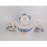 A Coalport porcelain part tea and coffee service decorated in the Revelry pattern, comprising pair