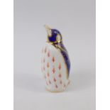 A Royal Crown Derby porcelain Imari paperweight modelled as a Penguin.