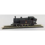 A miniature model of a locomotive, in British Rail livery and one section of track