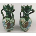 A pair of Lauder Barum scraffito and slipware three handled vases, each decorated with exotic fish