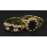 Two 9ct gold dress rings, to include a garnet set floral cluster ring, with a rope twist surround,