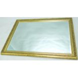 A modern gilt wall mirror, with a bevelled plate, 100cm x 70cm