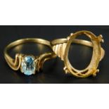 Two 9ct gold dress rings, to include a blue stone set dress ring, and a 9ct gold ring frame (AF), 5g