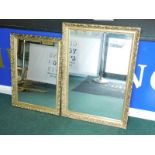 Two similar gilt rectangular wall mirrors, the largest 103cm x 63cm