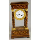 A 19thC French rosewood marquetry portico type mantel clock, decorated overall with scrolls, flowers