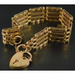 A 9ct gold gate bracelet, of four bar design, with padlock, and safety chain, 17.9g.