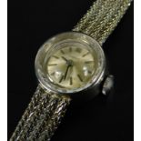 A Tissot ladies wristwatch, with small circular watch head, silvered dial, with four row bracelet,