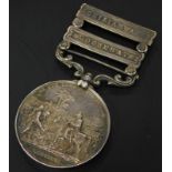 A Victorian 1849 Punjab medal, awarded to G Huggins of the 24th foot, with bars for Chillianwala and