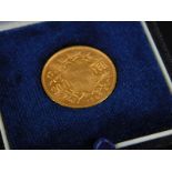 A Swiss gold 20 Franc coin, dated 1949, Helvetia, boxed.