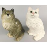 Two Beswick seated cats, model number 1867, one grey, the other white, matt glazed, various marks to