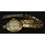 A Leda ladies wristwatch, with circular cream watch head, on a gold plated strap, (AF).