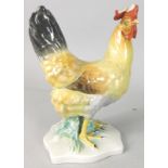 A Herend porcelain model of a cockerel, printed mark to underside, (AF), 18cm high.