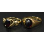 Two 9ct gold dress rings, to include one of twist design shoulders, set with red stone, and