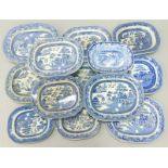 A collection of 19thC and later blue and white Willow pattern meat dishes, various sizes etc.