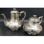 A Victorian Elkington silver plated teapot and matching coffee pot, with ribbed decoration,