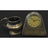 A silver mounted small table or portable clock, of tapering form, the gilt dial with Arabic