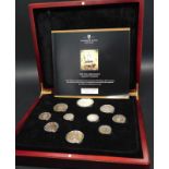 A London Mint Office limited edition 1953 Coronation Majesty coin year set, and also stamps from the