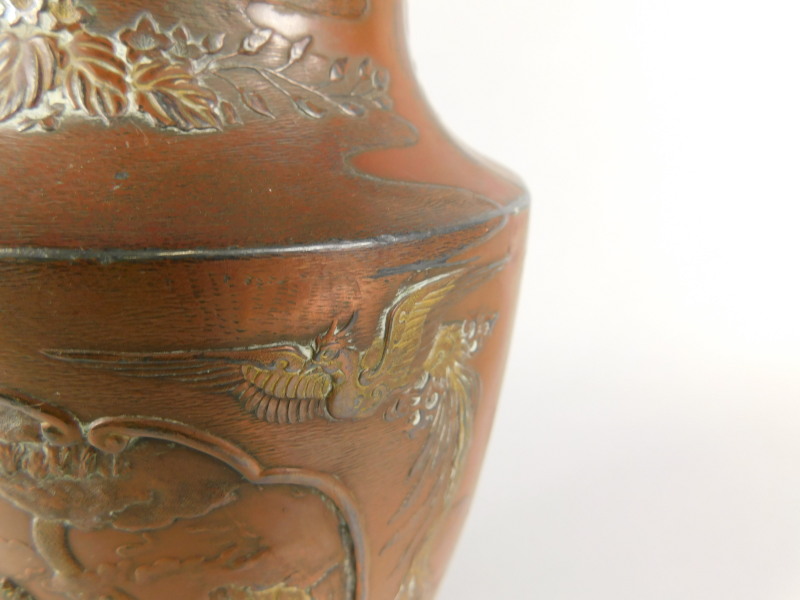 A Japanese bronzed spelter vase, with Meiji type decoration of landscapes, exotic birds, figures, - Bild 2 aus 2