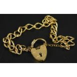 A 9ct gold charm bracelet, of curb links, with padlock, 6.1g.