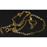 An 18ct gold fancy link chain, set with abstract design marquise shaped bars, 3.5g.