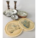 Various decorative items, to include place mats inset with fashion prints, various kitchen moulds