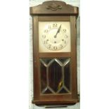 A 1920's mahogany wall clock, with silvered dial and Westminster chime etc., 77cm high