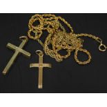 Two 9ct gold chains and crucifixes, to include one rope twist chain, and a fancy link chain, and two