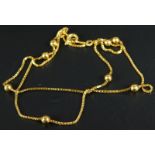 An 18ct gold necklace, with ball design, on box link chain, 4.2g.