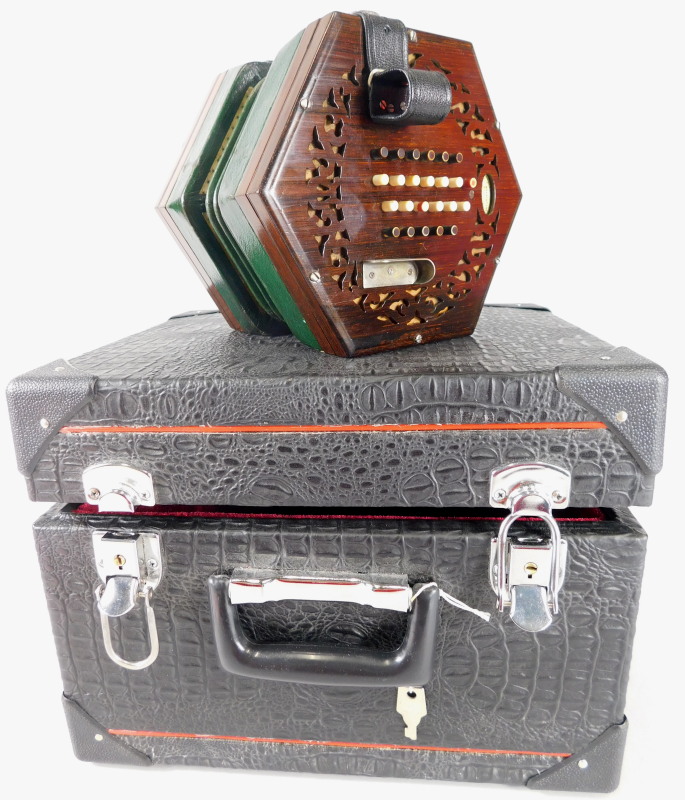 A Victorian rosewood concertina, made by C Wheatstone of London, with fifty ivory buttons