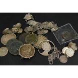 A quantity of various coins, to include some British and foreign silver examples, some mounted as