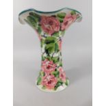 A Wemyss Lady Eve pattern pottery vase, with flared rim, decorated overall with pink roses and green