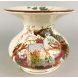 A Victorian pottery spittoon, printed in the Aesthetic style and hand painted in colour enamels with