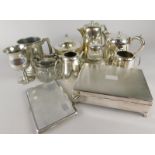 A collection of silver plate, to include a two handled sucrier with leaf cast border, a glass