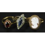 Three dress rings, to include two 9ct gold dress rings, one set with a cameo, the other stone set