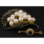 Two brooches, to include a fern spray brooch, set with pearls, marked Sterling, and a gold