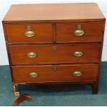 A George III mahogany chest, of two short and two long drawers, raised on bracket feet, 88.5cm