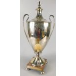 A 19thC silver plated two handled tea urn in Adam's style, lid with a vase shaped finial, engraved
