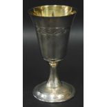 An Elizabeth II hammered silver goblet, engraved to the underside, Lincoln Cathedral, London 1977,