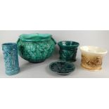 A Bretby turquoise glazed two handled jardiniere, with stylised flower and basket weave moulding and