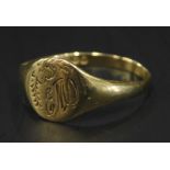 A 9ct gold signet ring, with floral design head, bearing initials E.W., 1.4g.