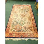 An Eastern style machine woven carpet, a Royal Palace hand made rug, in the Kirman style, 153cm x