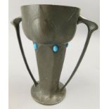 A Liberty style late 19th/early 2thC Art Nouveau pewter two handled vase, inset with turquoise