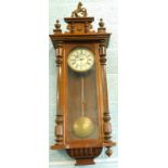 A late 19thC Gustav Becker Vienna wall clock, in walnut case, the enamel dial with Roman numerals