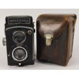 A Rolleicord IIb camera, a German version, with original leather case, lacking strap