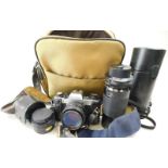 A quantity of camera equipment, to include a Tamron lens, Rollei single lens reflex camera etc.